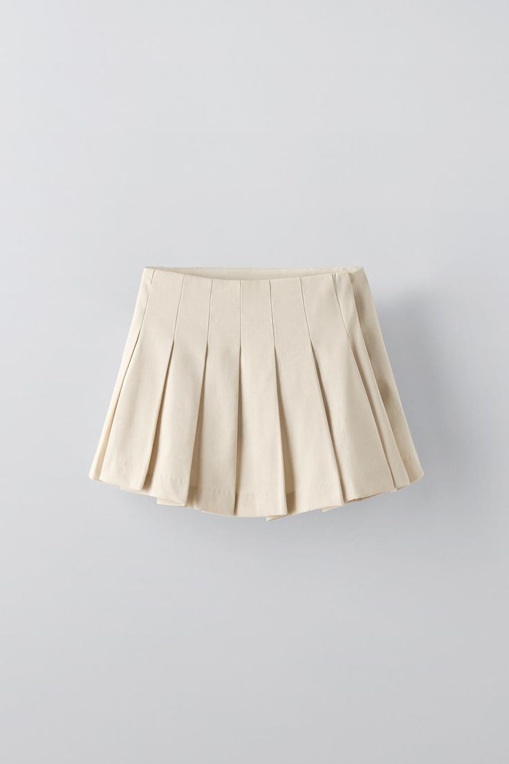 FLOWY PLEATED SKIRT - Sand | ZARA United States Spring Workwear Skort With Accordion Pleats, Pleated School Uniform Skort For Summer, Trendy Accordion Pleats Skirt For Work, Trendy Accordion Pleated Skirt For Work, Summer School Uniform Pleated Skort, Chic Pleated Skirt With Folds, Trendy Pleated Solid Color Skort, Chic High Waist Pleated Skort, Solid Chic Pleated Skirt