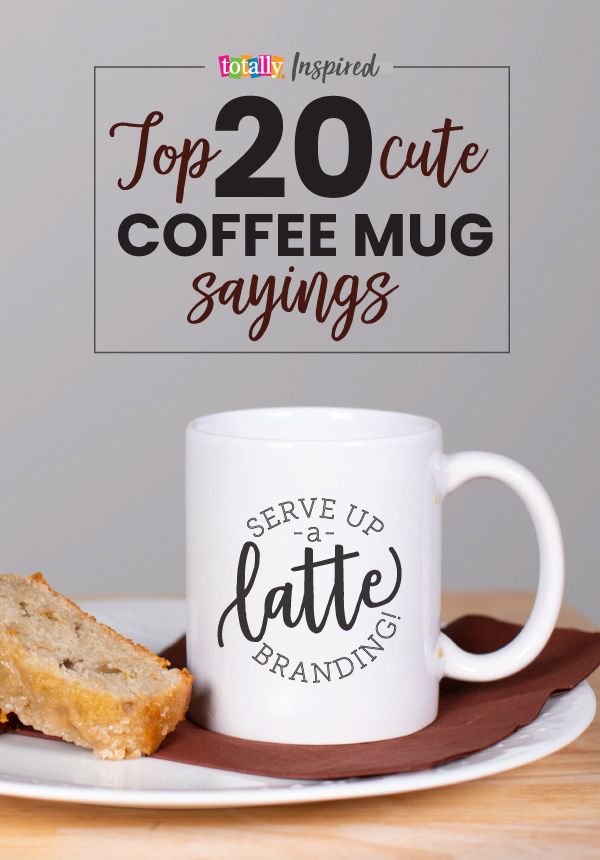 a coffee mug sitting on top of a white plate next to a piece of bread