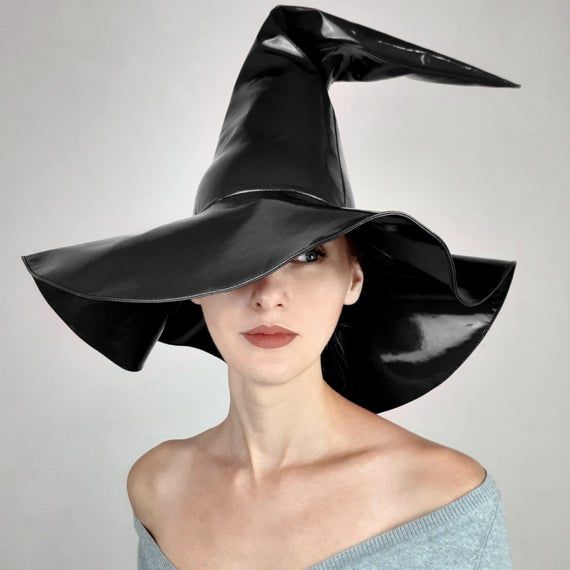 Glossy vinyl witch hat (cap) to complement the look or as a stand-alone costume.Handwork.Height 47cm / 18.5in Novelty Brimmed Halloween Costume Hats And Headpieces, Black Mini Hat For Halloween Cosplay, Novelty Brimmed Halloween Costume Hat, Fitted Hat For Cosplay, Fitted Wide Brim Top Hat For Halloween, Wide Brim Fitted Top Hat For Halloween, Fitted Witchy Hat For Halloween, Halloween Novelty Costume Hat With Wide Brim, Halloween Novelty Wide Brim Costume Hat