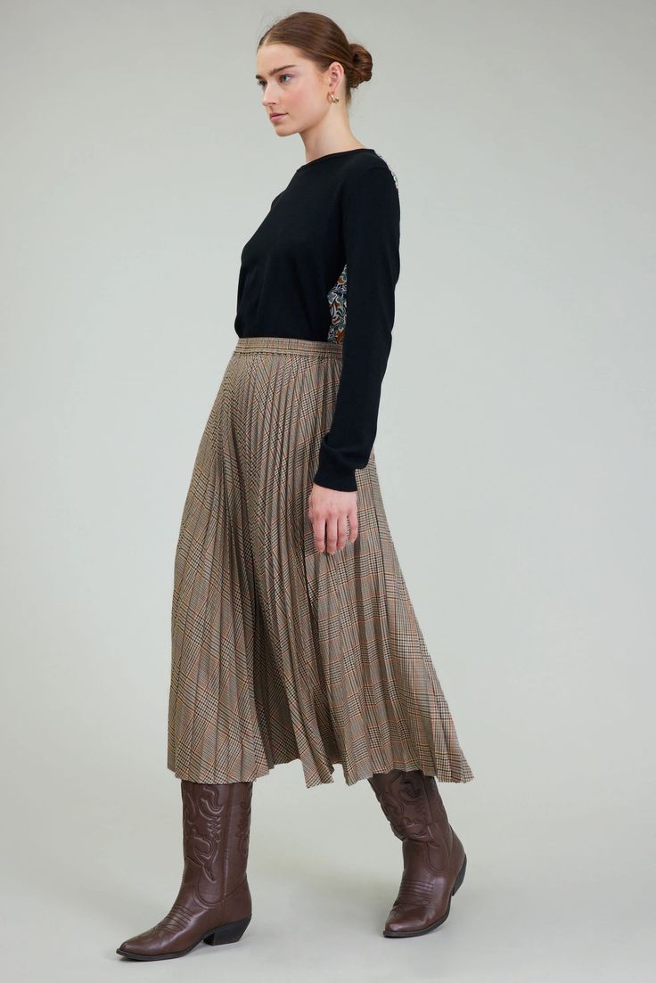 This A-line Plaid Midi Skirt boasts a comfortable elasticized waist and charming pleats that add effortless movement to your look. Pair with the matching jacket or a simple tee for a versatile outfit that transitions seamlessly from warm to cooler days. Expertly crafted for a stylish and comfortable fit. pleated elasticized waist camel multicolor midi length 100% polyester Fall Pleated Skirt With Elastic Waistband, Relaxed Fit, Chic Fall Bottoms With Pleated Waist, Chic Bottoms With Pleated Waist For Fall, Accordion Pleated Skirt For Fall, Fall Pleated Skirt For Workwear, Fall Wide Leg Lined Skirt Bottoms, Fall Wide Leg Lined Bottoms, Chic Relaxed Fall Skirt, Chic Bottoms With Pleated Hem For Fall