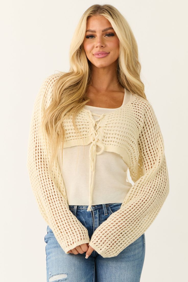 Cream Open Crochet Cropped Cardigan with Tank Top Casual Long Sleeve Knit Shrug, Cream Cropped Long Sleeve Sweater For Spring, Cream Long Sleeve Cropped Sweater For Spring, Long Sleeve Cotton Shrug For Fall, Open Knit Open Front Top For Fall, Casual Knit Shrug For Spring, Long Sleeve Cotton Shrug, Fall Open Front Open Knit Tops, White Long Sleeve Shrug For Fall