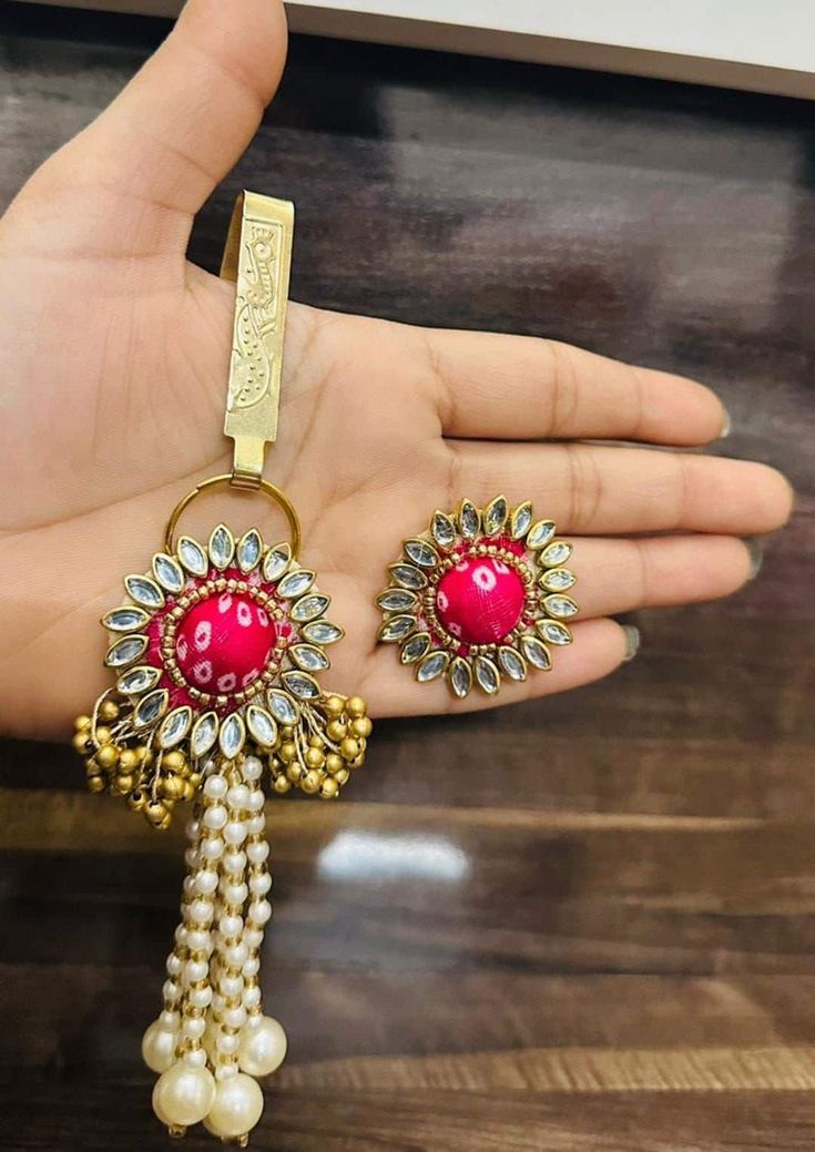 Give this beautiful pair of satka or challah with ring to your guest to make it more colorful . Different colors are available Diwali Gift Toe Ring Jewelry, Temple Jewelry Cutdana Jhumkas As Gift, Bollywood Style Tilla Tikka Gift, Temple Jewelry Style Kundan Tikka As Gift, Temple Jewelry Style Party Tikka With Tilla, Temple Jewelry Tikka For Festive Gift, Party Temple Jewelry Tikka With Tilla Details, Festive Temple Jewelry Tikka As Gift, Red Tikka With Tilla As Gift