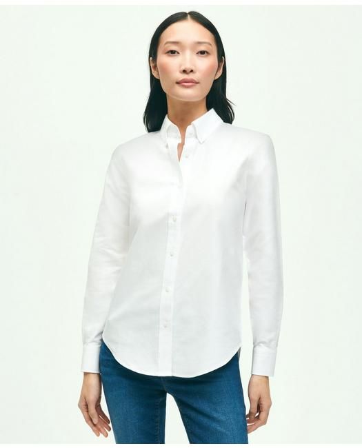 Our shirt is crafted from Oxford cotton with our signature button-down collar and 6-Pleat Shirring® at the cuff, for a nod to timeless American style. Classic silhouette that is straight in the bodyEmbroidered logo at chest100% CottonMachine washImported | Women's Classic-Fit Cotton Oxford Shirt | White | Size 2 Classic Daywear Blouse, Classic Everyday Tops, Classic Workwear Shirt With Placket, Classic Cotton Shirt For Daywear, Classic Business Blouse With Relaxed Fit, Classic Business Blouse Relaxed Fit, Classic Relaxed Fit Business Blouse, Classic Slim Fit Dress Shirt For Daywear, Classic Button-up Shirt For Everyday