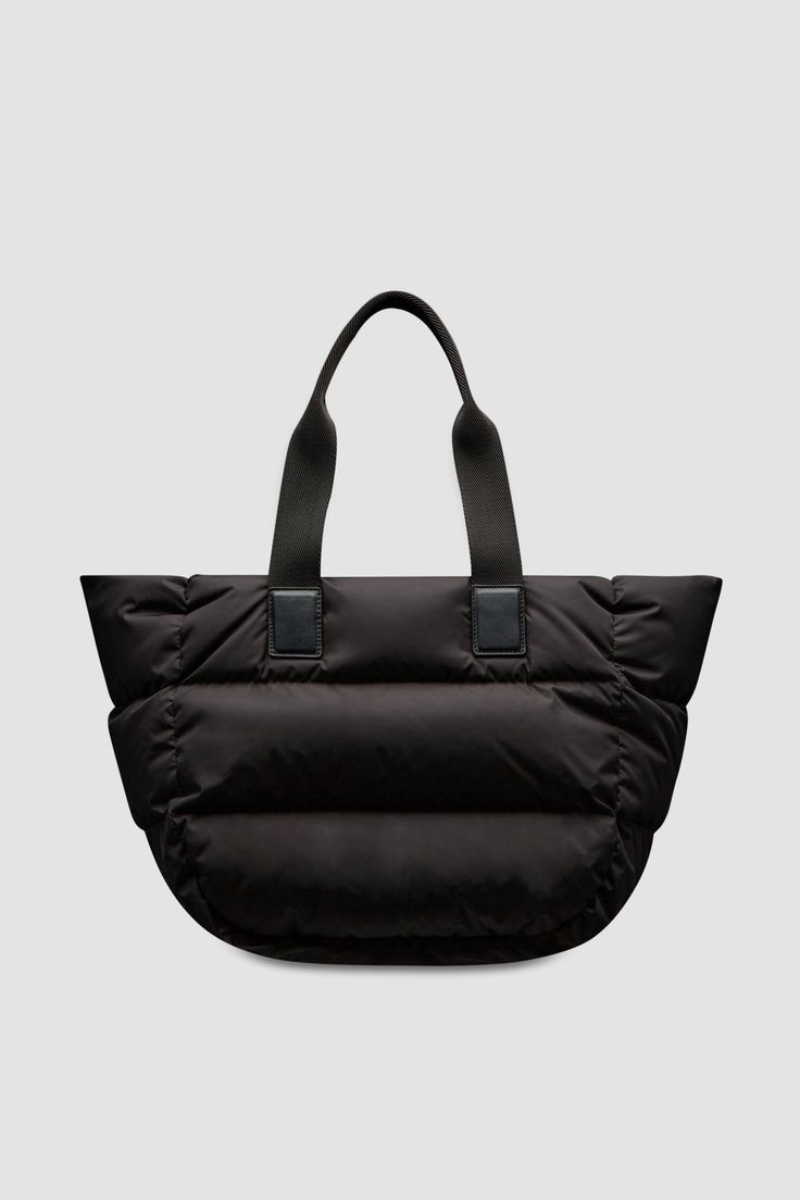 Inspired by iconic Moncler down jacket, the Caradoc bag is crafted from quilted nylon. Boasting an architectural, trapezoid shape, the spacious tote fits your daily work or shopping essentials. Cow Products, Shopping Essentials, Trapezoid Shape, Tote Bag Black, Small Crosses, Small Crossbody Bag, Small Accessories, Metallic Logo, Black Tote Bag