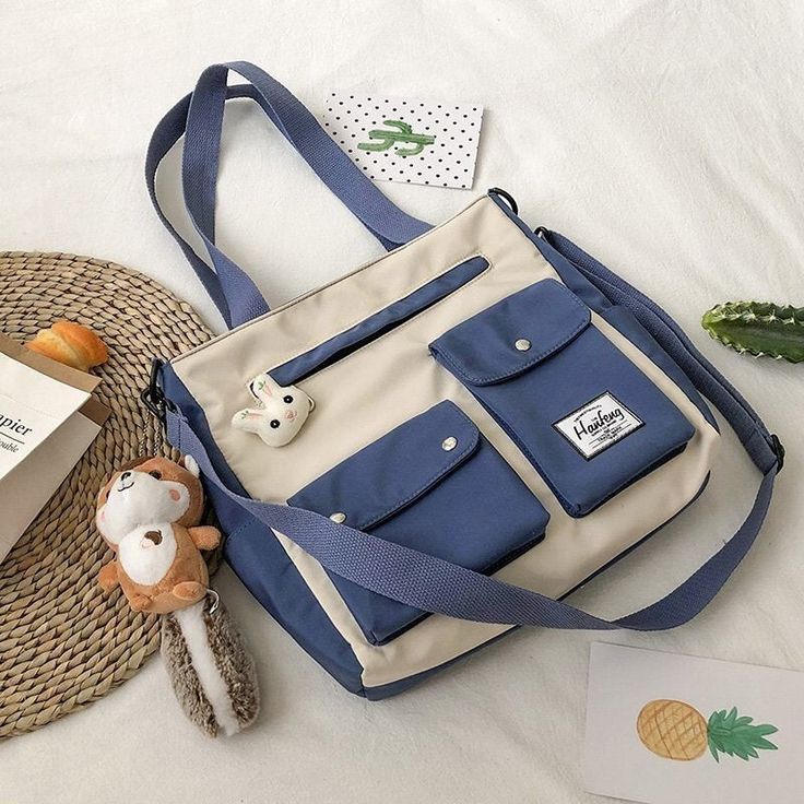 ShippingWorldwide?Express?Shipping Available Delivery time??7-15Days Fast Shipping Returns?Fast refund,?100% Money Back Guarantee. ? 30-day no-risk return policy Secure Payments?Via?CreditCard 100% brand new and high quality. ? Size:15*5*17cm Material:canvas Use:Shoulder?bag,?Handbags Origin ?US(Origin) Main Material ?Canvas Shape ?Casual Tote Gender ?WOMEN Occasion ?Versatile Exterior ?Silt Pocket Lining Material ?Polyester Pattern Type ?Cartoon Decoration ?Appliques Decoration ?Cartoon Printin Blue Canvas Backpack For Daily Use, Blue Canvas Bag With Zipper Pocket For School, Blue Student Bag With Zipper Pocket, Trendy Bags With Multiple Pockets For Students, Trendy Blue Shoulder Bag For Back To School, Blue Large Capacity Shoulder Bag For Back To School, Blue Canvas School Bag With Pockets, Blue Rectangular Shoulder Bag For Back To School, Blue Multifunctional Bags For Daily Use