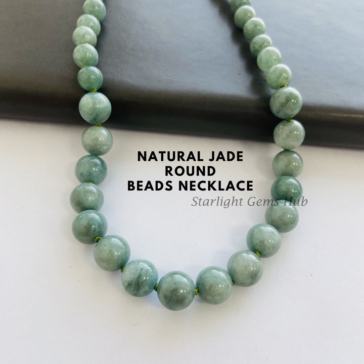 Product Description: Item Code: SGH-232 Stone Name: Green Jade Size: 6MM-10MM Shape: Smooth Round Color: Green Length: 18 Inches (Approx.) Weight: 217Cts (Approx.) Lock: 925 Lobster Clasp **All natural gemstones vary in color and pattern. We try our best to make our photos represent the real products in person. ** **All Customization Facility Is Available as per your Requirement Also in Other stones. ** **Bulk Order also available** **Please feel free to contact for any further queries** Affordable Jade Gemstone Bead Necklaces, Elegant Round Jade Crystal Necklaces, Spiritual Single Strand Round Jewelry, Spiritual Single Strand Jewelry, Spiritual Jade Crystal Necklaces With Round Shape, Jade Bead Necklace For Gifts, Jade Necklaces With Round Beads For Gifts, Jade Necklace With Round Beads For Gifts, Hand-strung Round Jade Necklaces