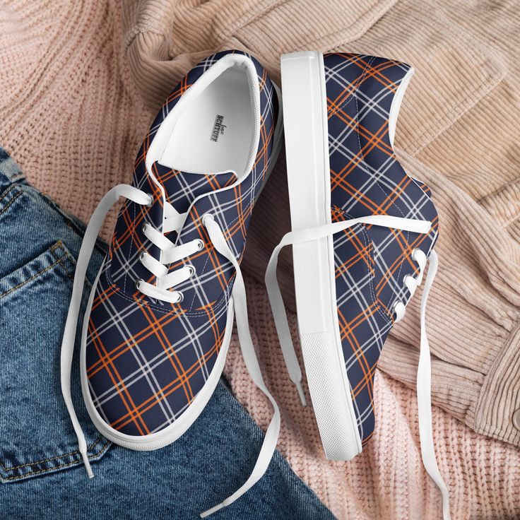 Step out with timeless style wearing our exclusive plaid canvas tennis shoes, a perfect blend of comfort, versatility, and standout flair; a one-of-a-kind accessory you won't find in stores--only available right here at our shop.   These classic low-top sneakers feature a vibrant mix of blue and orange plaid, adding a playful touch to any outfit all year round. Whether you're cheering on your favorite team, heading to the office, or enjoying a casual day out, these shoes bring a pop of personali Sporty Cotton Sneakers For Fall, Casual Orange Low-top Skate Shoes, Trendy Custom Low-top Canvas Sneakers, Trendy Low-top Canvas Custom Sneakers, Cotton Low-top Sneakers For Fall, Casual Orange Low-top Custom Sneakers, Fall Season Low-top Canvas Shoes, Blue Lace-up Sneakers For Fall, Orange Casual Custom Sneakers With Vulcanized Sole