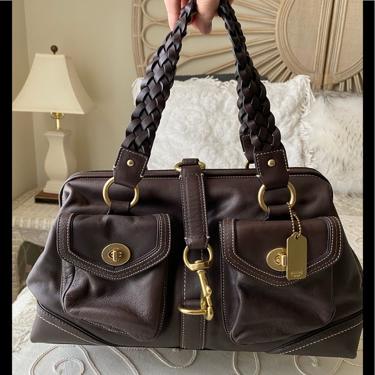 This Coach ‘Nwot’is A Great Doctor Bag Satchel. It’s A Rich Dark Chocolate Brown Leather With A Dog Leash Closure, And Great Braided Handles. This Bag Is Very Roomy And Has A Lavender Interior, Size Is 15”L X 9 1/2��”H X 5” W And The Beautiful Braided Handles Drop 7 1/2 “. This Bag Has Never Been Usednew! And What A Statement. 2000s Y2k Fashion, Vintage Doctor, Lavender Interior, Brown Winter Boots, Vintage Coach Bag, Luxury Bags Collection, Timeless Chic, Dark Chocolate Brown, Doctor Bag