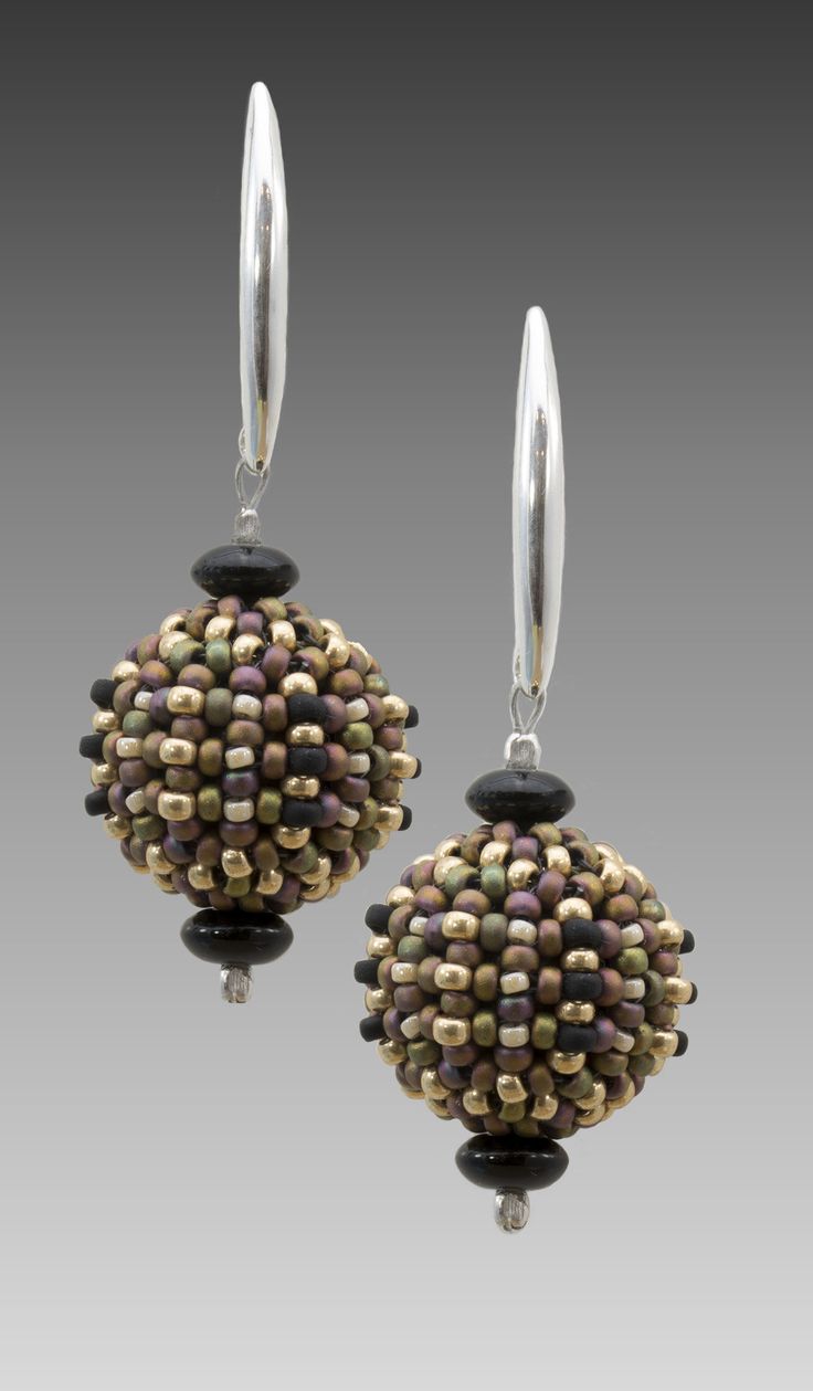 bronze, cream & black Unique Sterling Silver Earrings With Round Beads, Unique Sterling Silver Beaded Earrings, Artisan Earrings With Dangling Beads, Glass Earrings With Dangling Round Beads, Modern Handmade Beaded Drop Earrings, Modern Handmade Drop Beaded Earrings, Handmade Elegant Spherical Jewelry, Silver Beaded Earrings With Spacer Beads, Artisan Sterling Silver Round Bead Earrings