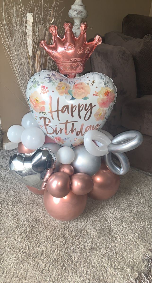 a bunch of balloons that are sitting on the floor