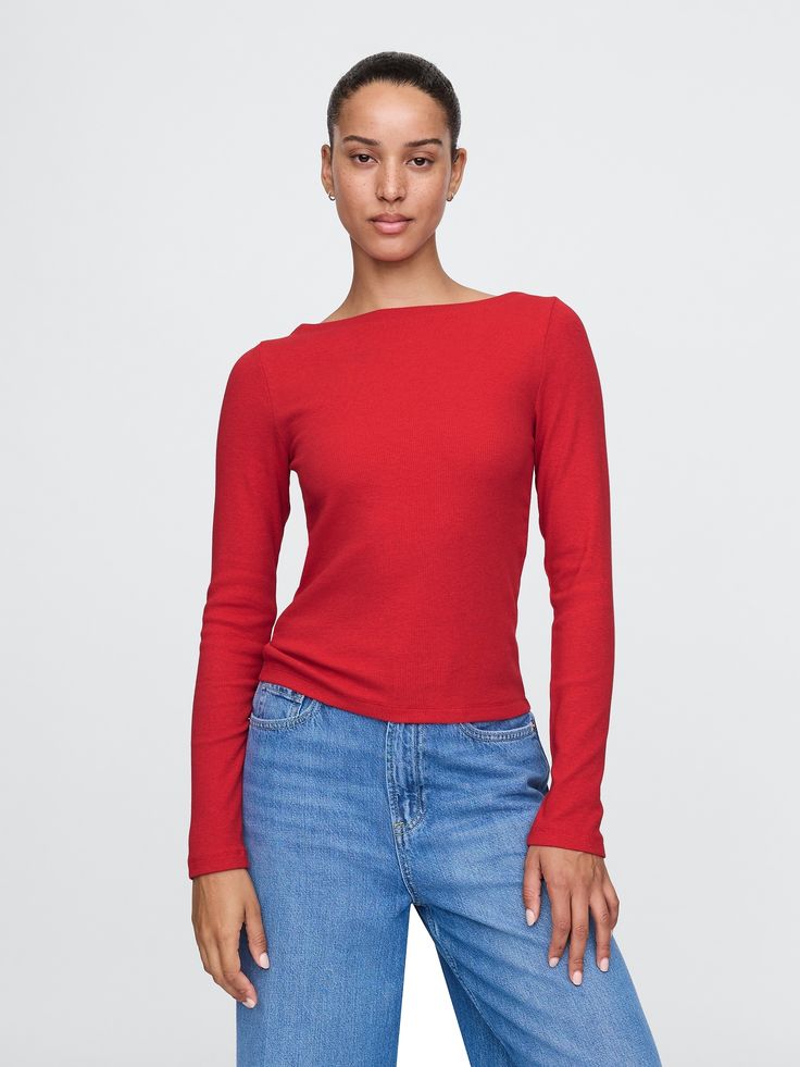 Soft cotton-modal blend, ribbed-knit cropped T-shirt.  Boatneck.  Long sleeves.  Certain styles have allover prints.  This product was made in a factory that runs the Gap Inc.  P. A. C. E.  Personal Advancement & Career Enhancement) program.  P. A. C. E.  is our educational program that helps the women who make our clothes build the skills, knowledge, confidence & resilience needed to advance in work & life.  Learn more here Fit: Stretch-to-Fit.  Slim & stretchy that forms to your shape.  Hits at the hip.  Models wearing Gap Gap Cropped Tops For Spring, Gap Relaxed Fit Tops For Fall, Trendy Stretch Tops By Gap, Trendy Stretch Tops From Gap, Gap Fitted Tops For Fall, Gap Crew Neck Tops For Fall, Spring Stretch Tops By Gap, Casual Cotton Crop Top By Gap, Gap Casual Cotton Crop Top