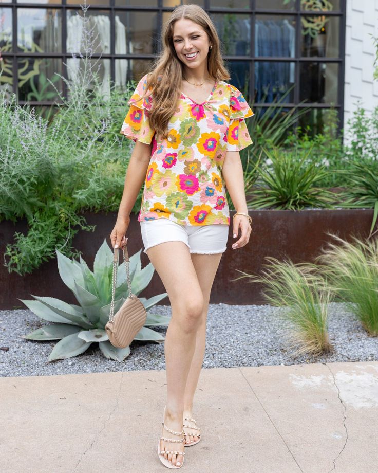 Multi Floral Summer Breeze Blouse | Multicolored Floral Blouse Summer is all about fun, bold patterns, and we’ve got you covered with the Summer Breeze Blouse! This gorgeous top features a subtle, lightly shirred v-neckline for a flattering and feminine fit; plus a playful double ruffle detail at the sleeves, all in a lightweight material and vibrant multicolor floral print that’s perfect for the season. Pair with some shorts and sandals and enjoy those breezy summer vibes! Why you’ll love it: S Blouse Summer, Grace And Lace, Bold Patterns, Pullover Cardigan, Jean Jeggings, Summer Breeze, Kimono Jacket, By Grace, Short Leggings