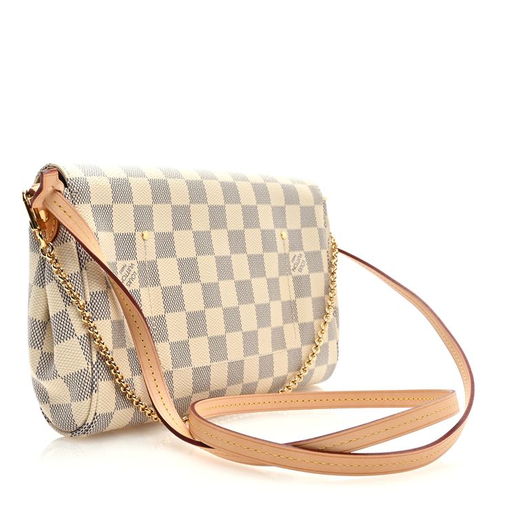 This is an authentic LOUIS VUITTON Damier Azur Favorite MM. This stylish shoulder bag is crafted of Louis Vuitton damier checked coated canvas in blue and white. The shoulder bag features a gold wristlet chain, an optional shoulder strap, damier piping and a flap trimmed with a Louis Vuitton logo plate in polished brass. The flap opens to a beige canvas fabric lining with a patch pocket. Louis Vuitton Logo, Favorite Mm, Louis Vuitton Damier Azur, Stylish Shoulder Bag, Polished Brass, Authentic Louis Vuitton, Louis Vuitton Damier, Piping, Patch Pocket