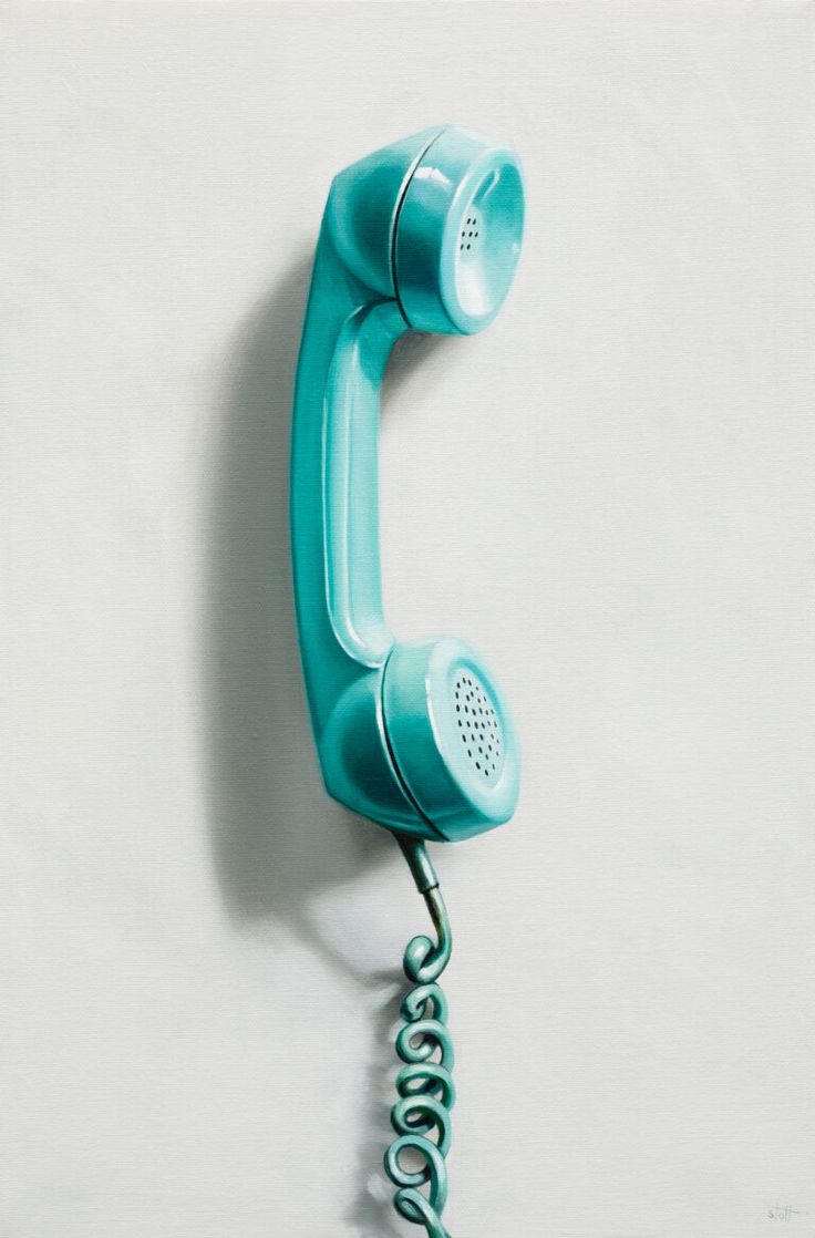 an old - fashioned phone is hanging on the wall with a cord attached to it