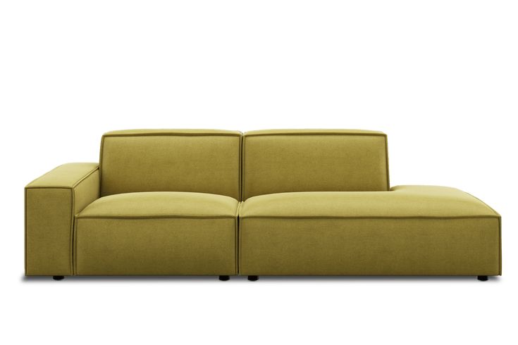 a yellow couch sitting on top of a white floor