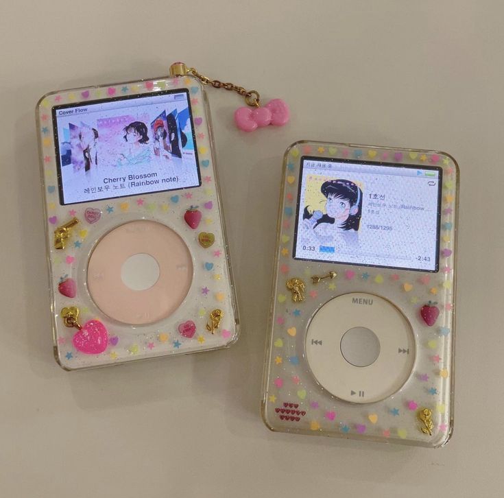 two ipods are sitting next to each other