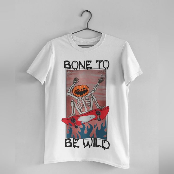 Handmade Punny Shirt! A Skateboarding Pumpkin Head Skeleton *Unisex Sizing *All Sizes Available White Skull Print Shirt For Summer, White Shirt With Skull Print For Summer, Casual Tops For Summer Skateboarding, Casual Summer Tops For Skateboarding, White Skull Print Relaxed Fit T-shirt, White Relaxed Fit T-shirt With Skull Print, Summer Graphic Tee For Skateboarding, Graphic Tee For Skateboarding In Summer, Casual Skull Print Shirt With Relaxed Fit