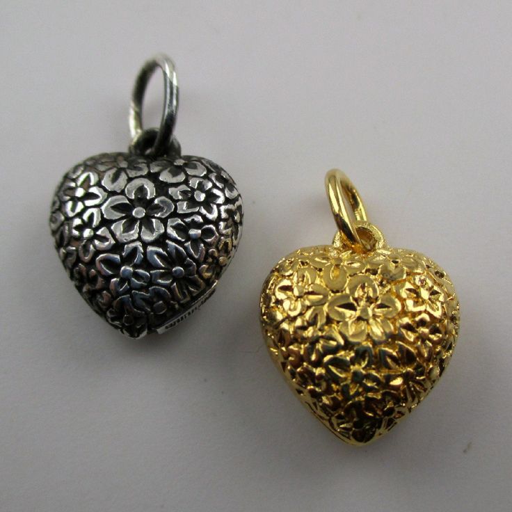 "This sterling silver, two-sided Solid Puffy Heart Charm Number 75 (Floral Heart) features a repeating design of flowers.Marked, Sterling. Made by Brown County Silver. Vintage and in new, never worn condition. Approximately 30 years old. Available in sterling silver and sterling silver with 14k gold vermeil. 3/4\" high with jump ring. 1/2\" wide 2.4 grams approx. *Chain not included See more @ https://www.etsy.com/shop/brocosi" Silver Heart Necklace With Charms For Valentine's Day, Silver Heart Necklace With Heart Beads, Silver Open Heart Necklace With Charms, Silver Double Heart Necklace With Heart Beads, Handmade Silver Heart Necklace, Handmade Silver Double Heart Necklace, Puffy Heart Charms, Brown County, Hearts Valentines