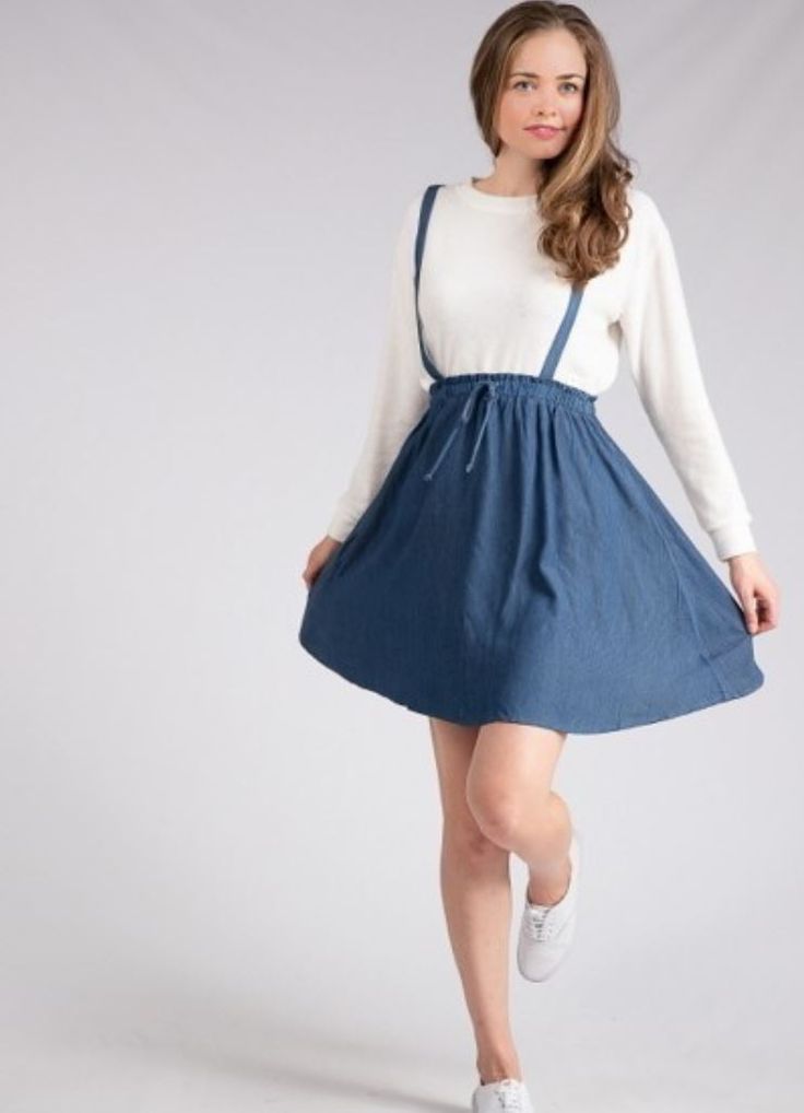 This adorable overall skirt is the perfect comfy, casual piece! It has a cinched waist with a tied string in the front, and an A-line cut skirt. Model is wearing a small. 100% rayon *Free shipping & returns on orders over $50! Casual A-line Skirt For Daywear, Casual Spring Suspender Dress For Day Out, Casual Tie Waist Skirt For A Day Out, Casual Spring Suspender Dress With Tie Straps, Casual Sundress With Tie Straps For Day Out, Casual Mini Suspender Dress For Day Out, Cotton Suspender Dress With Tie Straps For Day Out, Casual Drawstring Sundress For Day Out, Casual Sundress With Tie Fastening