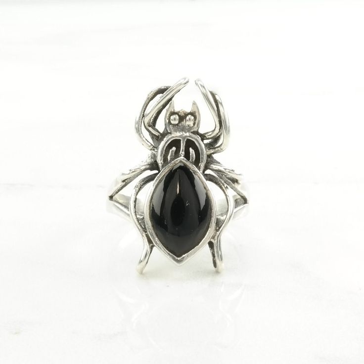 This ring is a size 7 3/4 (USA); It may be resized. Markings: Han, 925, J (Tested & guaranteed to be Sterling Silver) This ring weighs 5.2 Grams The Stone/Design is Black Onyx Spider   Natural  The Stone/Design measures 11.9 x 7.7 mm The Ring face measures 25.6 x 16.4 mm The condition of this ring is Estate, Great, light patina This vintage item is circa pre 2005  To have us do the resize, add this listing and the resize listing to your cart and select which size you would like this ring to be o The Ring Face, Silver Rings Simple, Vintage Sterling Silver Rings, Stone Design, Rings Statement, Black Onyx, Vintage Sterling Silver, Sterling Silver Ring, Favorite Jewelry