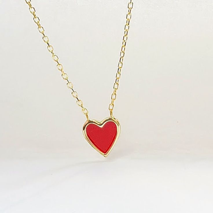 Red Heart Charm Gold Necklace Adjustable 17 inches long 18kt yellow gold over pure fine sterling silver 925. Timeless red heart 8mm charm gold necklace with the accent of red enamel on the heart charm. Perfect for any red accent outfit, great gift for wife, girlfriend etc. Best as a Bridal Party Gift for bridesmaids as a token of appreciation, thank you gift or for any red theme wedding parties, and for any fashionable red accent accessory outfit. Elegant gifts for weddings, birthdays, holidays, Red Accent Outfit, Heart Gold Necklace, Family Reunion Gifts, Reunion Gift, Outfit Elegante, Necklace Girlfriend, Outfit Elegant, Red Theme, Heart Charm Necklace