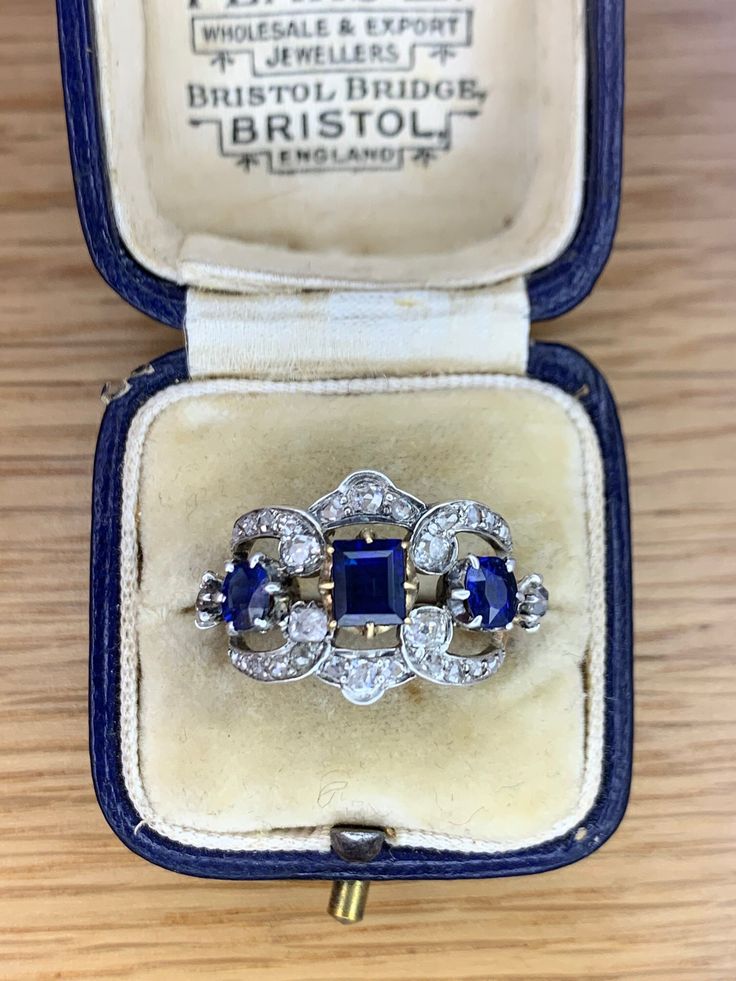 A Fabulous 2ct Sapphire & 2ct Diamond Art Deco Cluster Ring - Etsy Vintage Sapphire Three Stone Diamond Ring, Vintage Sapphire Three Stone Ring, Vintage Sapphire Three-stone Ring, Vintage Sapphire Rings Stamped 14k, Vintage Sapphire Cluster Ring With Gemstones, Classic Sapphire Ring Collectible, Collectible White Gold Sapphire Ring, Antique Sapphire Ring With 17 Jewels, Vintage Sapphire Gemstone Diamond Ring