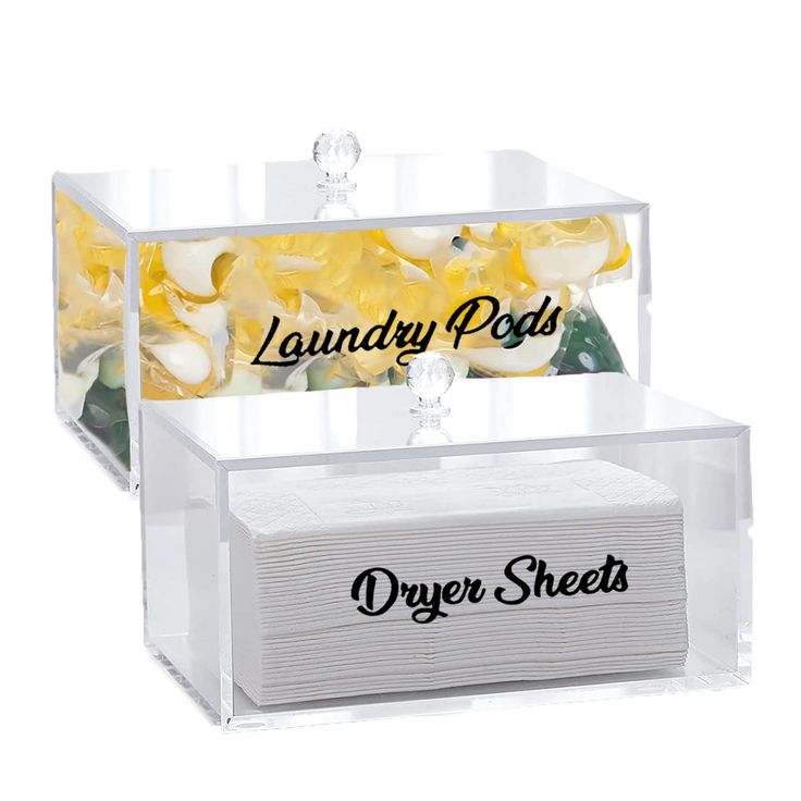 two clear acrylic boxes with flowers in them and the words laundry pods on top