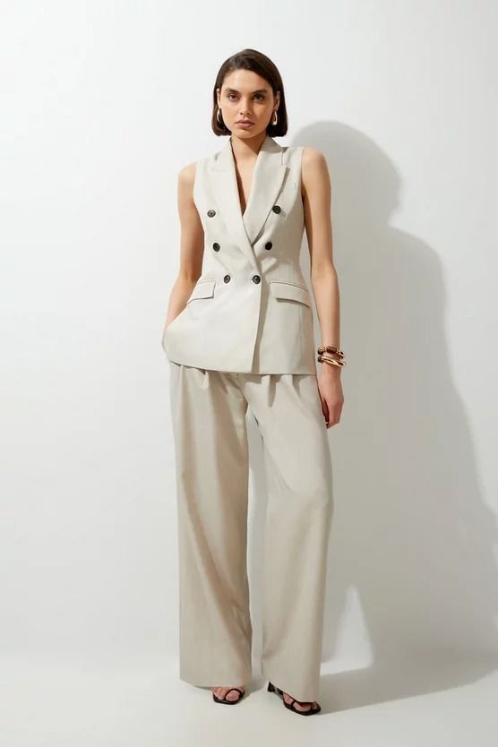 Melange Double Breasted Sleeveless Tailored Blazer | Karen Millen Sleeveless Suits With Buttons For Work, Lapel Collar Vest With Buttons For Workwear, Elegant Blazer With Vest And Lapel Collar, Elegant Beige Vest For Work, Spring Tailored Sleeveless Suit, Sleeveless Tailored Blazer With Button Closure, Tailored Sleeveless Blazer With Button Closure, Elegant Beige Notch Lapel Vest, Elegant Beige Vest With Notch Lapel