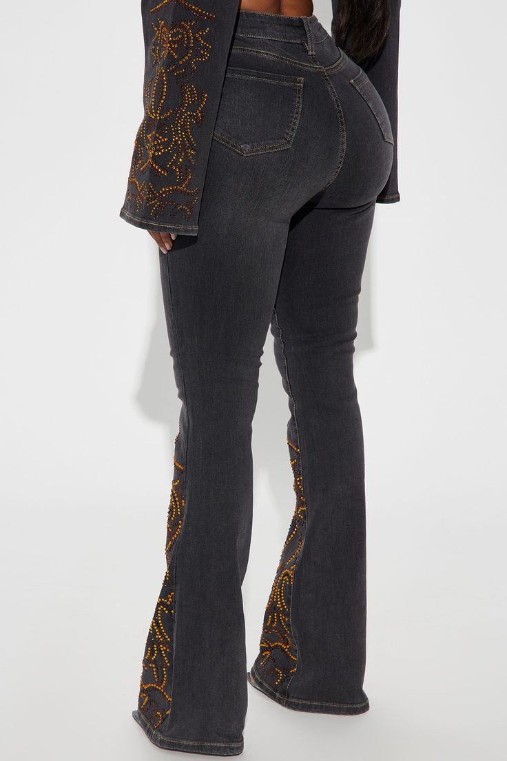 Available In Black Wash. Pair With Lone Ranger Embellished Denim Jacket Flare Jean 5 Pocket Embellished 34" Inseam 11" High Rise Medium Stretch Disclaimer: Due To The Specialized Wash Process, Each Garment Is Unique. 72.5% Cotton 25.6% Polyester 1.9% Spandex Imported | Lone Ranger Embellished Stretch Flare Jeans in Black Wash size 13 by Fashion Nova Trendy Fitted Jeans With Rhinestones, Trendy Embellished Bottoms For Fall, Trendy Embroidered Fall Jeans, Fitted Embellished Bottoms For Fall, Casual Embellished Jeans For Fall, Embellished Fitted Jeans For Fall, Embellished Denim Bottoms For Fall, Fall Embellished Denim Bottoms, Embellished Denim Jeans For Night Out