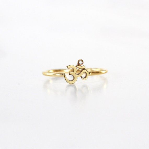 Om Ring Om Ring Design For Women Diamond, Spiritual Yellow Gold Brass Jewelry, Spiritual Gemstone Toe Ring Jewelry, Spiritual Round Recycled Gold Jewelry, Spiritual Jewelry In Recycled Gold, Spiritual Gold Sterling Silver Jewelry, Spiritual Gold Plated Jewelry With Polished Finish, Spiritual Yellow Gold Jewelry In Recycled Gold, Spiritual Round Promise Rings