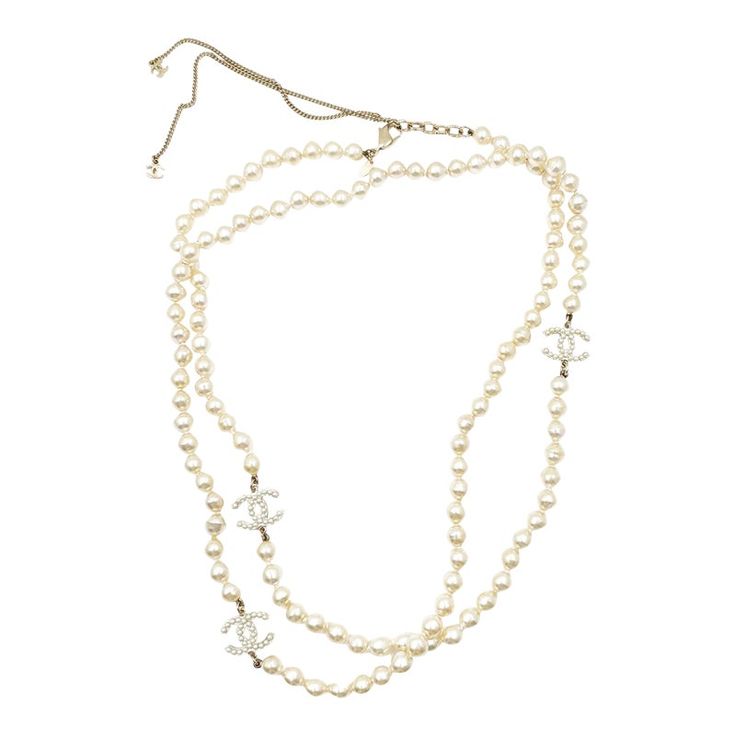 This is part of Chairish’s Costume Jewelry assortment.  Chanel 3 Gold CC Pearl Faux Fresh Water Pearl Long Necklace   * Marked 12 * Made in France * Comes with the original box   -It is approximately 46". -The cc pendant is approximately 0.55″ x 0.9″. -Wear it as a long necklace or double it as a short necklace -Some of the pearls have blemishes.  -In a good condition Elegant White Jewelry With Logo Charm, Elegant Silver Necklace With Logo Charm, White Formal Jewelry With Logo Charm, Formal White Jewelry With Logo Charm, Elegant White Necklace With Logo Charm, Luxury Pearl Necklace With Adjustable Chain, Luxury Long Pearl Necklace, Elegant Formal Necklace With Logo Charm, Pearl Long Necklace