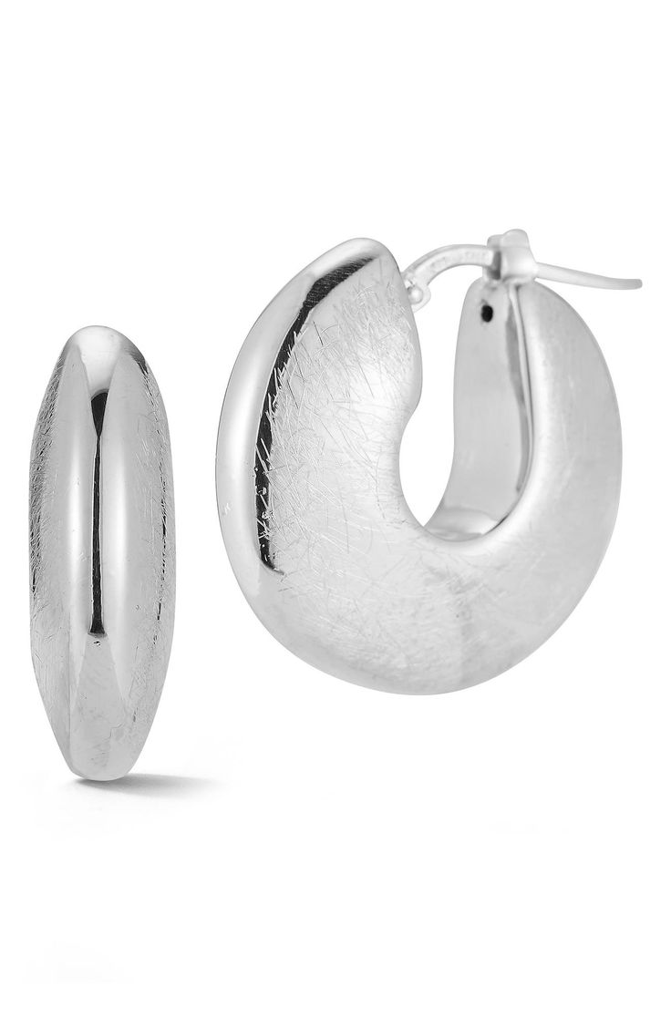 An artfully textured finish brings contemporary appeal to chunky hoop earrings crafted from polished sterling silver or 18-karat gold vermeil. 7/8" hoop diameter Snap-post closure Sterling silver or sterling silver/18k-gold plate Made in Italy Small Hammered Hoop Earrings For Formal Occasions, Modern Hammered Hoop Earrings For Formal Occasions, Modern Hammered Hoop Earrings For Formal Events, Modern Hammered Huggie Earrings, Modern Polished Hoop Earrings For Anniversary, Modern Small Hoop Hinged Earrings, Modern Small Hinged Hoop Earrings, Contemporary Silver Small Hoop Earrings, Small Silver Contemporary Hoop Earrings