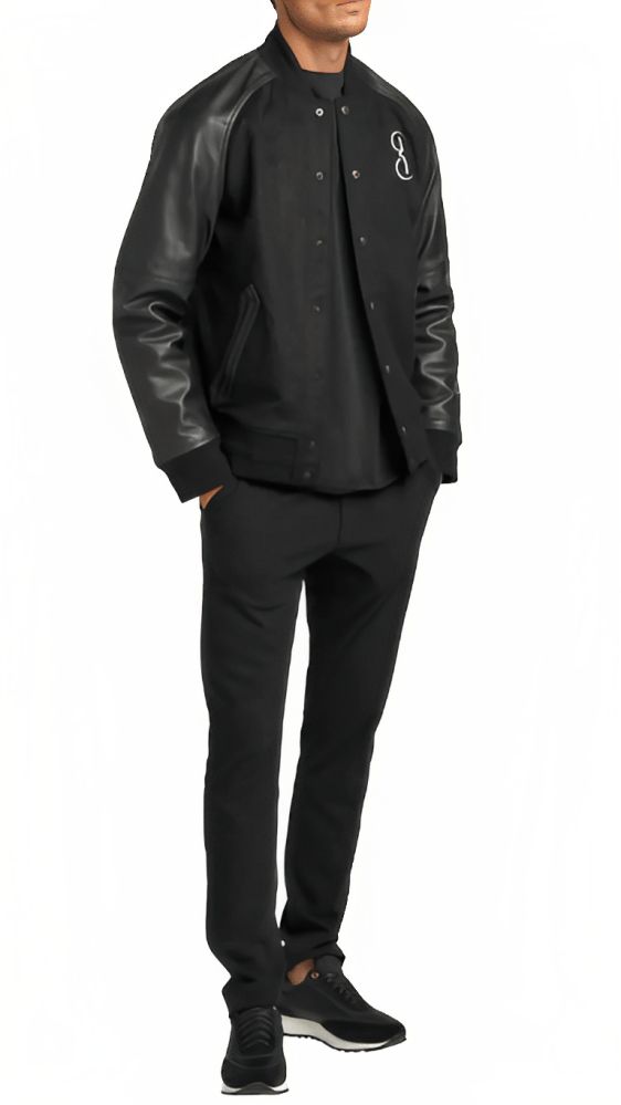 Men's Varsity Bomber Leather Jacket In Black Our Men's Black Varsity Bomber Leather Jacket by Arcane Fox combines design and comfort. It has a timeless look and is made of real sheepskin leather with a semi-aniline gloss. The rib-knit collar and cuffs are classic, and the snap button closing is convenient. The varsity jacket's viscose lining keeps you warm, and it has two side pockets and an internal pocket for storage. In sleek black, this is a must-have. Outer Shell: Real Leather Leather Type: Sheepskin Leather Finish: Semi-aniline Inner Shell: Viscose Lining Closure Style: Snap Buttons Collar Style: Rib Knit Cuffs Style: Rib Knit Inside Pockets: One Outside Pockets: Two Side Pockets Color: Black Masculine Leather Jacket For Workwear In Winter, Black Varsity Jacket With Pockets For Work, Leather Varsity Jacket For Winter Workwear, Classic Black Varsity Jacket With Pockets, Classic Black Leather Varsity Jacket, Masculine Black Leather Jacket For Work, Urban Black Varsity Jacket For Workwear, Black Leather Outerwear With Ribbed Cuffs, Black Leather Sport Coat With Pockets