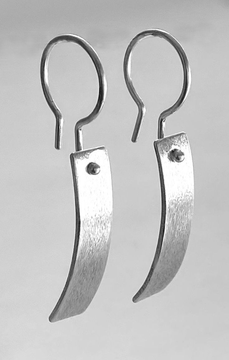 Silver Earrings - These sleek and sophisticated sterling silver earrings invite wonder with their curved profile and subtle texture. Sterling silver French hooks. Steel Jewelry Handmade, Titanium Jewelry Handmade, Silversmith Earrings, Contemporary Jewelry Earrings, Architectural Earrings, Primitive Jewelry, Silversmith Jewelry, Hammered Silver Jewelry, Avant Garde Jewelry