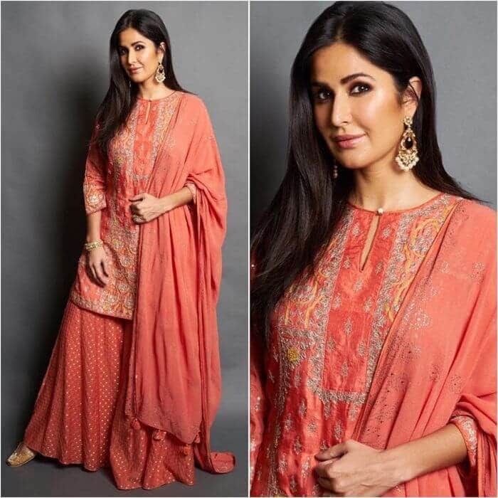 Katrina Kaif's tangerine-colored sharara outfit is a perfect choice. This sharara outfit has a yoke-style embroidery around her neck and gold embroidery across the kurta. Her ensemble was complemented by matching sharara leggings with gold block designs and a modest dupatta. If Customer wants this dress with Customized Stitching it will be Free this will take few days to dispatch it.All size in stock(S,M,L,XL,XXL,3XL,4XL) Suit Set Design, Salwar Suit Pattern, Sharara Outfits, Anarkali Patterns, Silk Sharara, Party Wear Salwar, Kameez Designs, Bollywood Party, Bollywood Dress