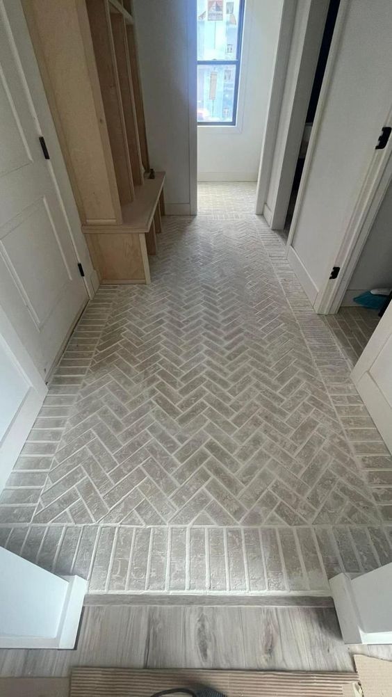 Entryway Flooring Ideas Tile Herringbone, Floor Tiles Mudroom, Brick Floors Laundry Room, Foyer Entry Tile Ideas, Brick Tile Entryway Floor, Modern Entryway Tile Floor, Entry Tile To Wood Transition, Tile For Sunroom, Farmhouse Tile Entryway