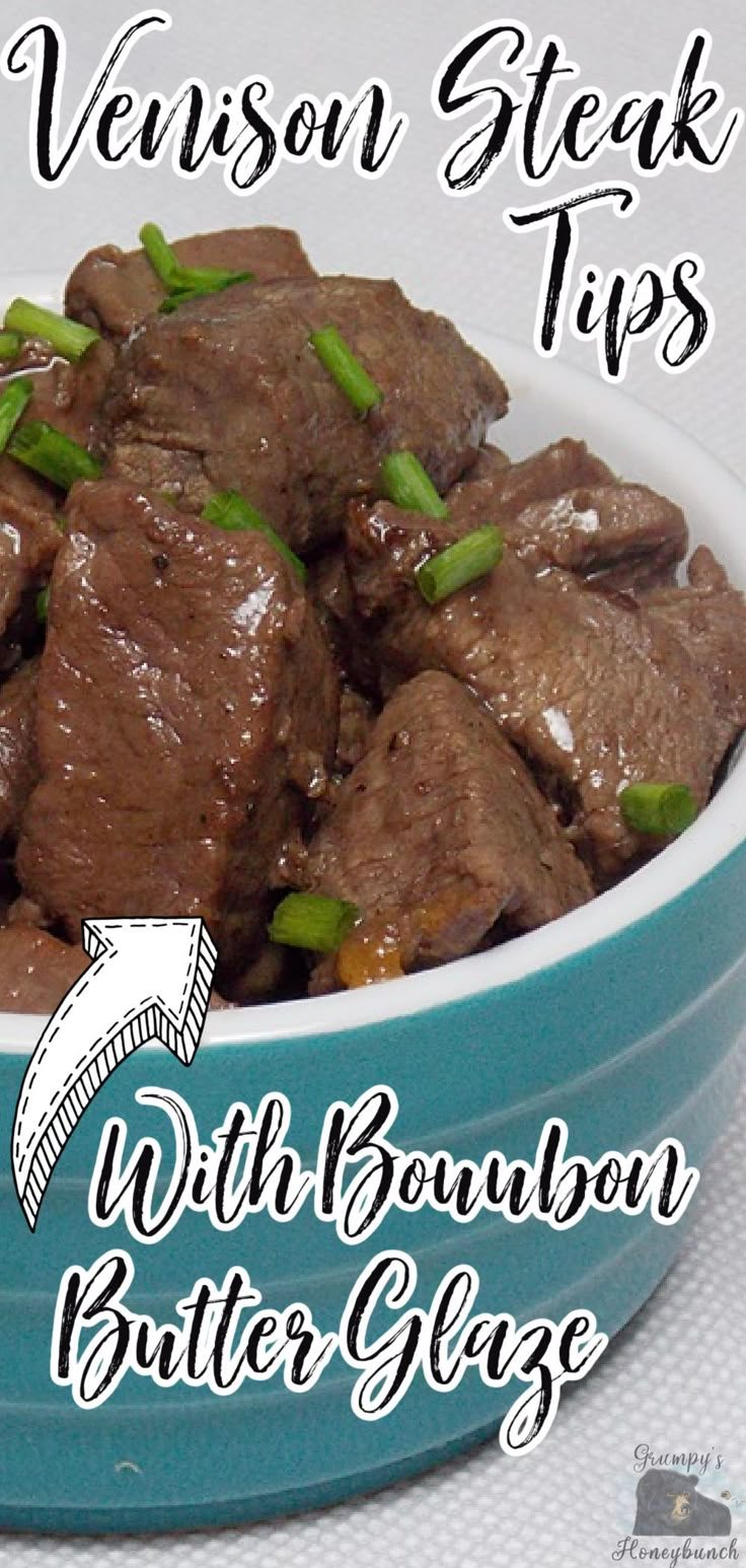 a blue bowl filled with beef and green onions on top of a white tablecloth