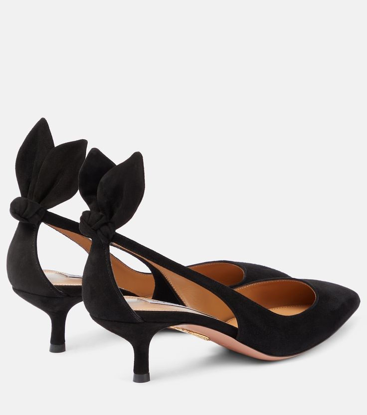 a pair of women's black high heels with bows on the toe and heel