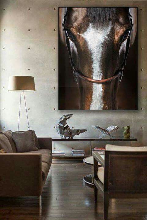 a horse's head is shown in this living room