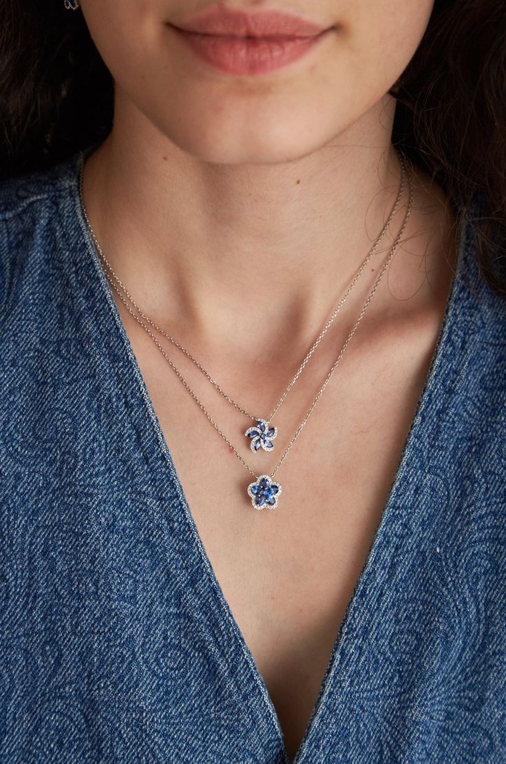 "𝓦𝓮𝓵𝓬𝓸𝓶𝓮 𝓽𝓸 𝓛𝓲𝓸𝓷𝓱𝓮𝓪𝓻𝓽 𝓳𝓮𝔀𝓮𝓵𝓻𝔂 𝓢𝓱𝓸𝓹 ♥ Our Stunning, Diamond and Sapphire Flower charm necklace handcrafted in high quality 18K White Gold. This gorgeous necklace is crafted with high quality Diamonds and Print Set Sapphires with the most beautiful shine. The necklace is beautiful on its own and dainty, or great to style and stack with other chains and necklaces. Please note the possibility of natural inclusions in gemstones. If you desire a length that is not listed b Fine Jewelry Blue Necklace With Flower Pendant, Fine Jewelry Blue Flower Pendant Necklace, Blue Flower Pendant Fine Jewelry Necklace, Elegant Blue Flower Pendant Necklace, Flower Charm Necklace, Necklace Flower, Flower Charm, Gorgeous Necklaces, Quality Diamonds