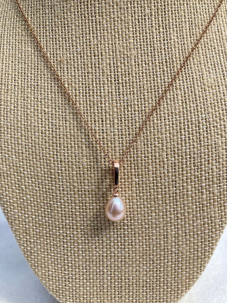 Cute freshwater pearl pendant/charm/pearl enhancer! The pearl is a drop/pear shaped 8-8.5mm genuine freshwater pearl. It has a lovely pink natural colour. The snap bail is made of rose gold plated sterling silver. This piece can be clipped onto a pearl necklace as a pearl enhancer or used as a regular pendant on a chain. If selected, the chain is an 18 inch 14k rose gold filled cable chain. Pearl necklace not included. For the matching pink baroque shape pearl necklace, please visit the followin Teardrop Pearl Pendant Necklace, Rose Gold Jewelry With Teardrop Pearl Pendant, Pear-shaped Pearl Drop Necklace, Rose Gold Pearl Pendant Necklace, Rose Gold Teardrop Necklace With Pearl Pendant, Rose Gold Teardrop Jewelry With Pearl Charm, Rose Gold Pear-shaped Pearl Drop Jewelry, Pink Pearl Pendant Jewelry For Gift, Pink Pendant Pearl Necklace For Wedding