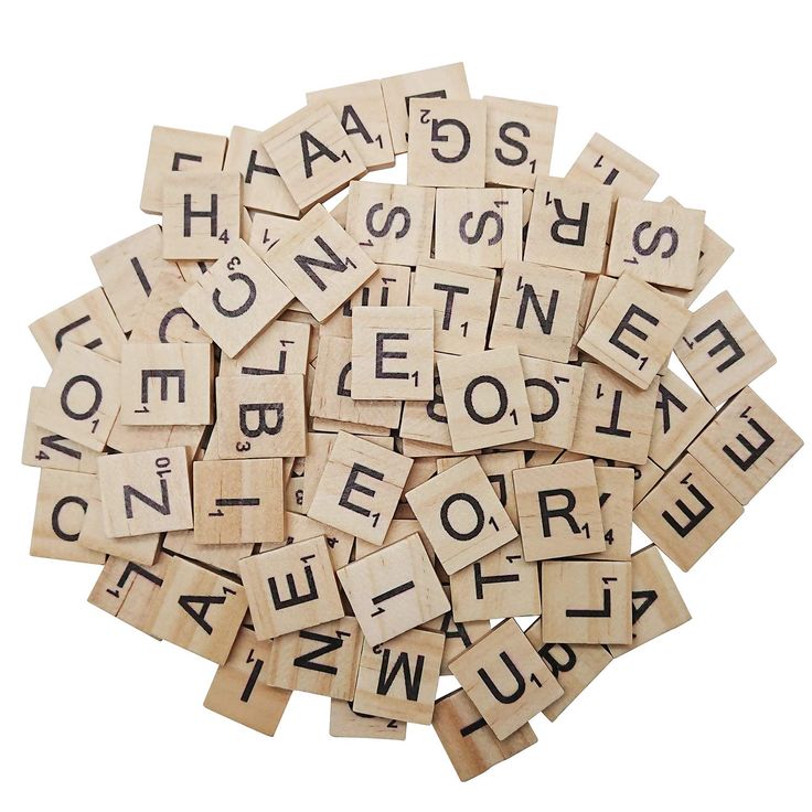 wooden scrabbles with letters and numbers arranged in the shape of an alphabet