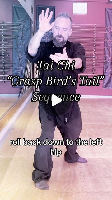 a man standing on top of a wooden floor in front of a bowling ball with the words tai chi grasp bird's tail sequence