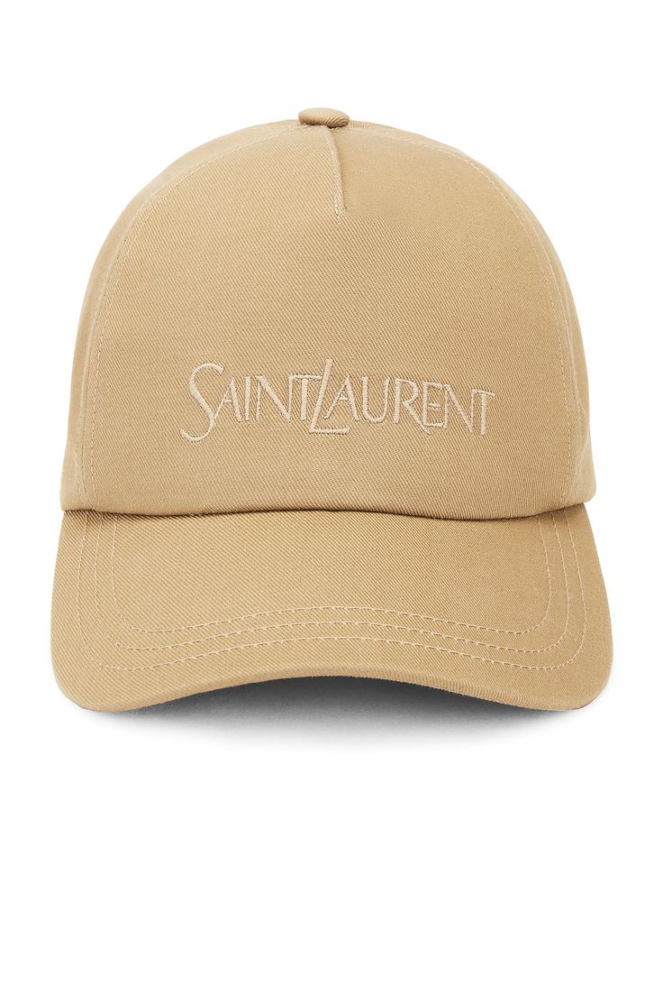 Find SAINT LAURENT Vintage Cap on Editorialist. Saint Laurent Vintage Cap in Beige Cotton canvas with embroidered Saint Laurent logo at front. Made in Bulgaria. Adjustable back strap. Brim measures approx 2.75 in length OS measures approx 21 in circumference. SLAU-WA364. 778063-3YP19-9700. About the designer: SAINT LAURENT has been influencing and revolutionizing the fashion industry since the debut of its iconic ‘Rive Gauche’ collection in 1966 - the couture house was the first to create a read Ysl Cap, Saint Laurent Logo, Ysl Handbags, Saint Laurent Vintage, Designer Caps, Distressed Baseball Cap, Denim Cap, Anthony Vaccarello, Vintage Cap