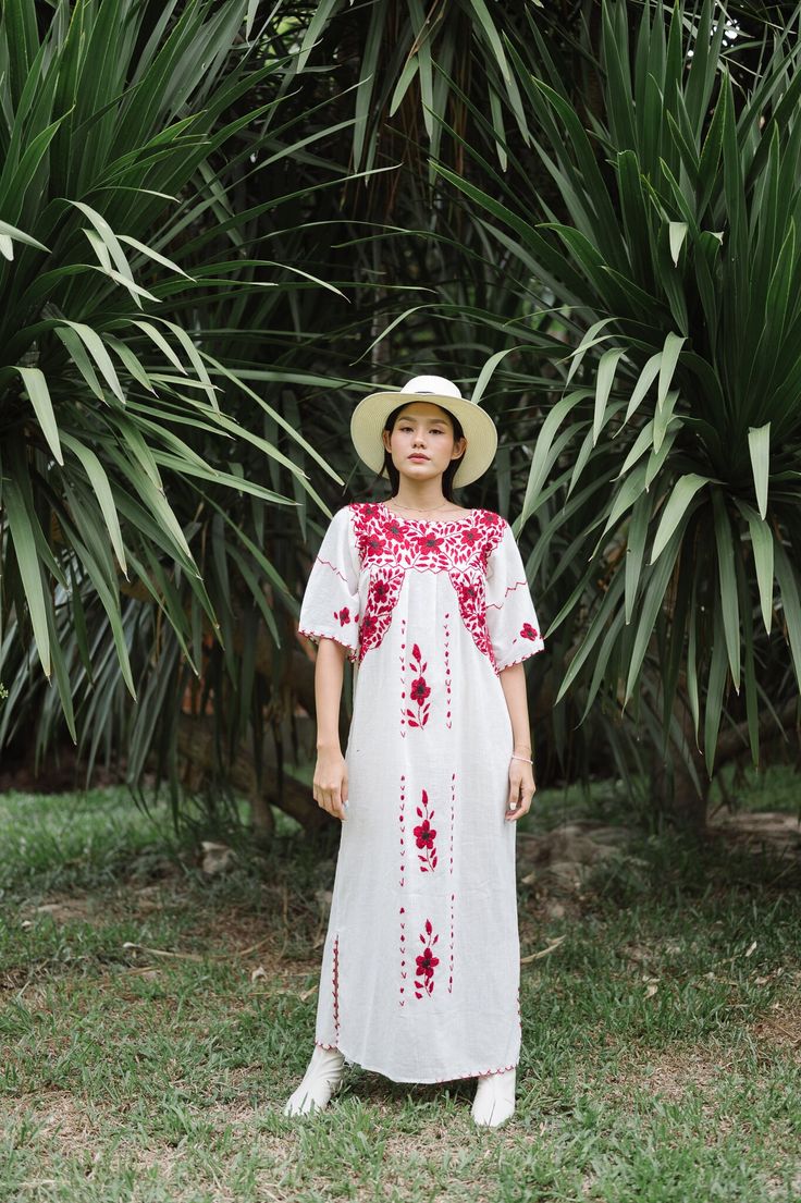 "Beautiful Antique 0ff-White Cotton Gauze Maxi Dress with Floral Hand Embroidery . Features hand embroidered flowers on chest front, neck and sleeves. Half Sleeve drawstring at cuff sleeves. Condition: Good Vintage Condition. ** black spot on hip area and missing embroidered detail on skirt. \"shown in the detailing picture \" BEST FIT = M Please be sure to check the measurements to insure a perfect fit. Details and Measurements (Inch) BUST: 38 \" HIPS: 50 \" FULL LENGTH: 52 \" SLEEVE LENGTH: 11 Red Folk Embroidered Dress With Floral Design, Summer Festive Dress With Geometric Embroidery, Red Folk Style Dress With Floral Embroidery, White Short Sleeve Dress With Floral Embroidery, Red Folk Style Dress With Intricate Embroidery, White Embroidered Dress With Resham Embroidery For Summer, Traditional Red Embroidered Dress With Geometric Patterns, Traditional Red Embroidered Dress With Geometric Design, White Embroidered Dress With Resham Embroidery For Spring