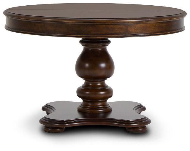 a round wooden table with two pedestals on each side and one end at the top