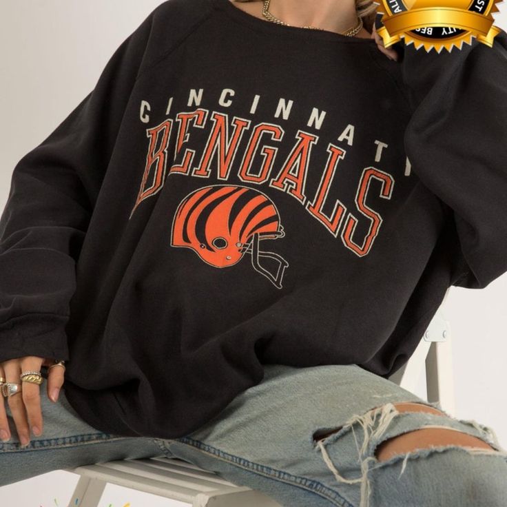 Vintage Nfl Cincinnati Bengals Helmet Shirt, Football Fan T-Shirt Sweatshirt Hoodie, Vintage Graphic Tee, Unisex Shirt, Gift For Men Women Product Information Promise That You Will Get The Best Products We Have. With Variety Of T Shirts Styles, Sizes And Colors. -------- Sweatshirt - Gidan 18000 -------- "Spun Yarn For Softer Feel And Reduced Pilling Double-Needle Stitching At Shoulders, Armholes, Neck, Waistband And Cuffs 1x1 Rib With Spandex For Enhanced Stretch And Recovery Classic Fit Tubular Body Grey Pearlized Tear Away Label Transitioning To New Black Razor Tear Away Label In 2023 See Colours For Exceptions" *Care Instructions: Machine Wash: Warm (Max 40c Or 105f); Non-Chlorine: B Bengals Helmet, Sunday Football, Bengals Football, Football Sunday, Nfl Shirts, Football Sweatshirt, Shirt Football, Game Day Shirts, Football Outfits