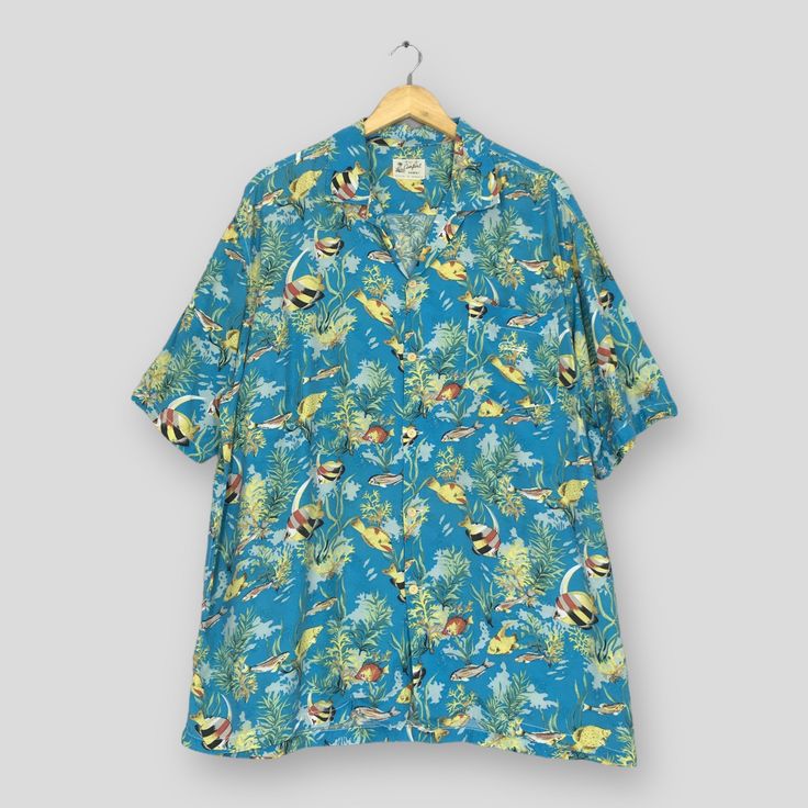 Vintage Aloha Hawaiian Japanese Fish Rayon Shirt XLarge Hawaii Beach Surf Aloha SeaWorld Abstract Shirt Honolulu Wear Buttondown Size XL Good Used Condition. No holes and stains. Size (On Tag) : Size XL **To make sure if it FITS YOU, refer at the exact measurements. Size Measurement (All measurements were taken lying flat) : Width [armpit to armpit] : 25.5 inches / 65 cm Length [shoulder to end of garment] : 29 inches / 74 cm THIS IS USED CLOTHING! PLEASE DON`T EXPECTED IT TO BE LIKE NEW OR DON` Printed Button-up Camp Shirt For Beach, Button-up Hawaiian Shirt With Palm Tree Print For Beach, Palm Tree Print Button-up Hawaiian Shirt For Beach, Hawaiian Button-up Beach Tops, Printed Button-up Hawaiian Shirt For Beach, Beach Hawaiian Shirt With Relaxed Fit, Beach Hawaiian Shirt With Palm Tree Print, Vacation Printed Button-up Hawaiian Shirt, Printed Button-up Hawaiian Shirt For Vacation