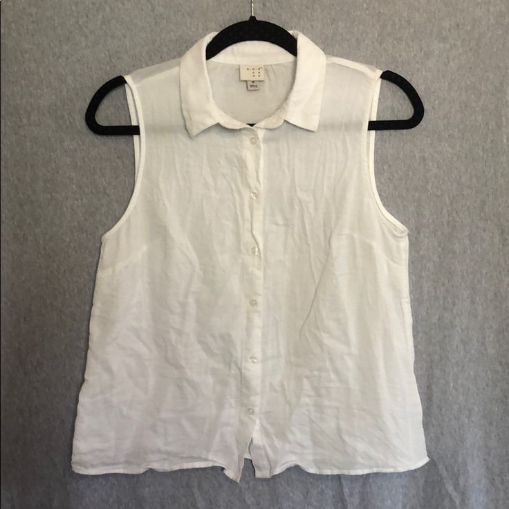 A New Day By Target. Size M. Never Worn. Tags Removed. Linen-Like Cotton - Feels Soft And Amazing But Will Wrinkle Naturally. Flared/Swing Bottom. Chic Sleeveless Cotton Shirt, Casual Sleeveless Shirt For Work, Casual Sleeveless Everyday Blouse, Cotton Button-up Vest Top, Casual Sleeveless Blouse For Everyday, Casual Sleeveless Summer Shirt, Casual Sleeveless Shirt For Summer, Everyday Sleeveless Tops With Buttons, Sleeveless Shirt For Spring Workwear