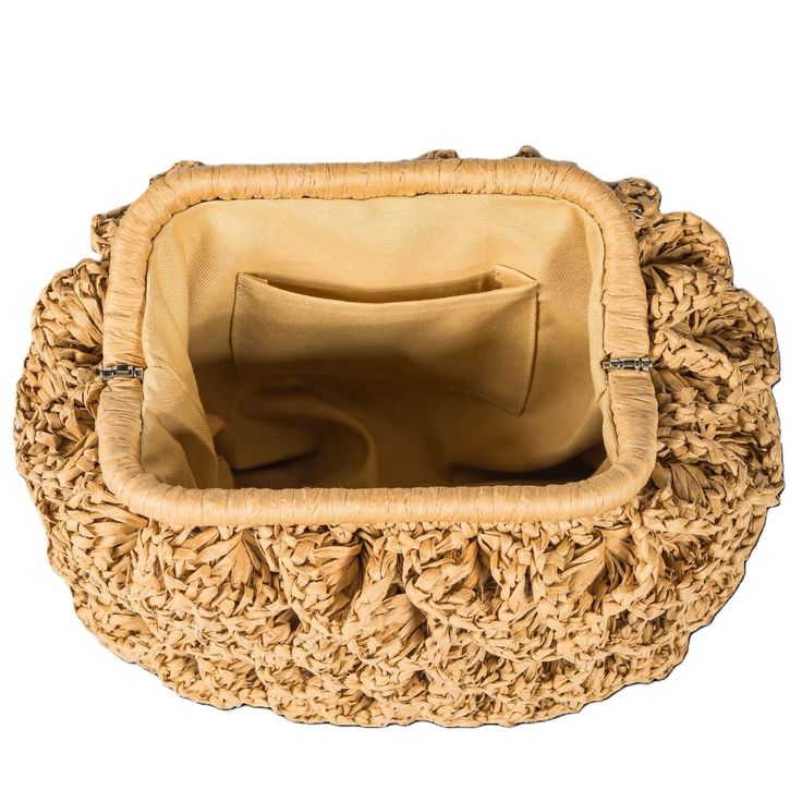 This bag, in the color of coffee with milk, is meticulously handcrafted from raffia yarn. It has a lined interior with pockets for added functionality. Suitable for both day and night use, this bag stands out with its elegant and stylish design. An accessory you'll never want to be without, it combines aesthetic appeal with practicality, making it perfect for everyday use. Width: 30cm Length: 20cm Base: 10cm Raffia yarn Lined interior for added durability and protection Mica handles for a touch Chic Brown Straw Bag With Removable Pouch, Beige Straw Bag With Woven Leather Top Handle, Rectangular Cream Straw Bag With Woven Leather, Cream Rectangular Woven Leather Straw Bag, Beige Crochet Bag With Woven Leather Top Handle, Beige Crochet Top Handle Bag With Woven Leather, Beige Handwoven Top Handle Bucket Bag, Chic Beige Crochet Bag With Woven Leather Details, Chic Beige Crochet Bag With Woven Leather